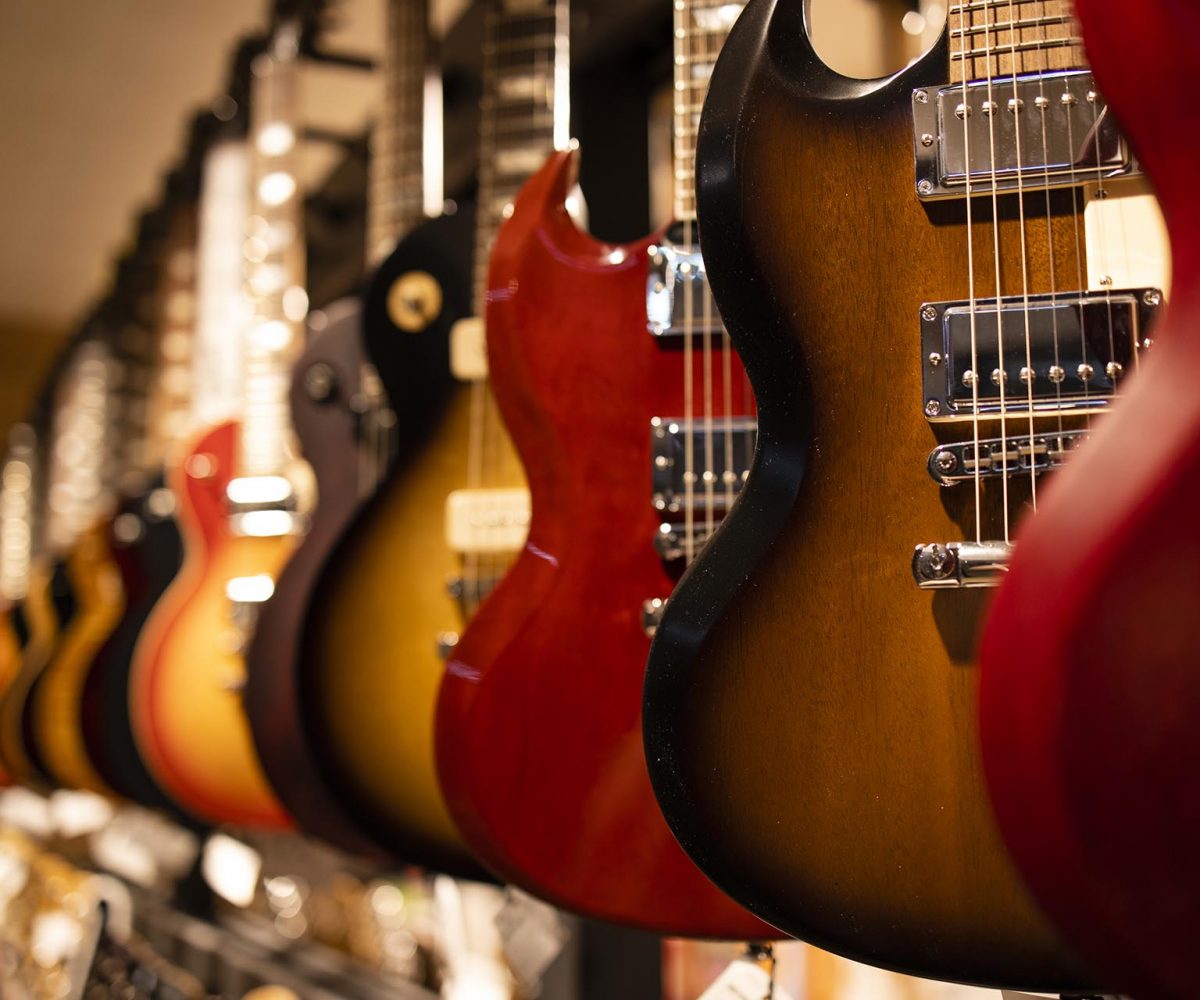 Electric guitars for sale in music shop.